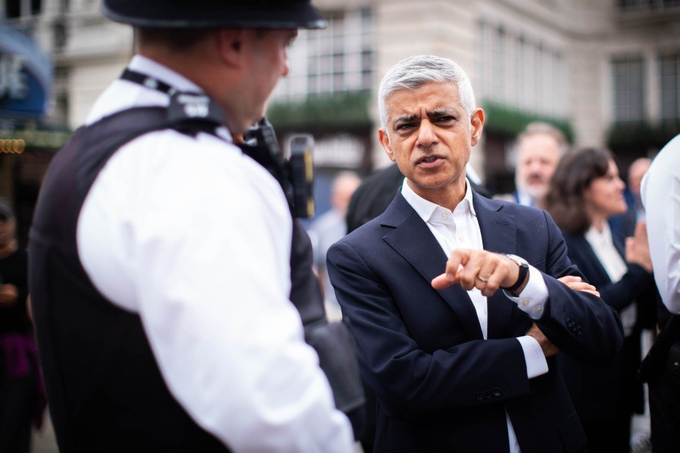 Mayor Sadiq Khan speaking with police officers.