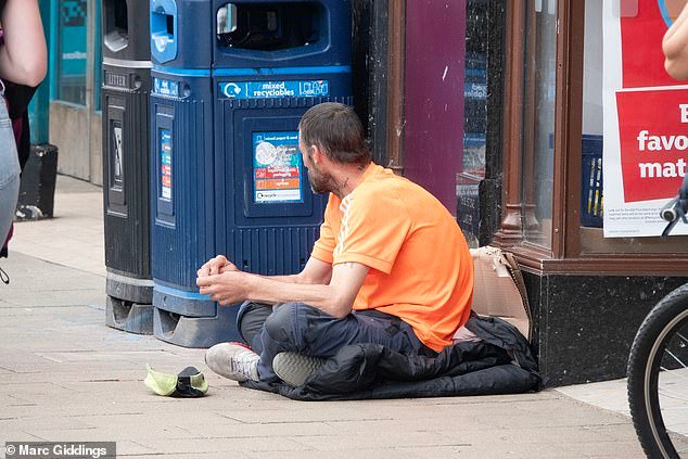 Jack Wills, Fraser Hart, and The Body Shop have all closed doors since the beginning of last year. Pictured: A man begging outside the Sainsbury's
